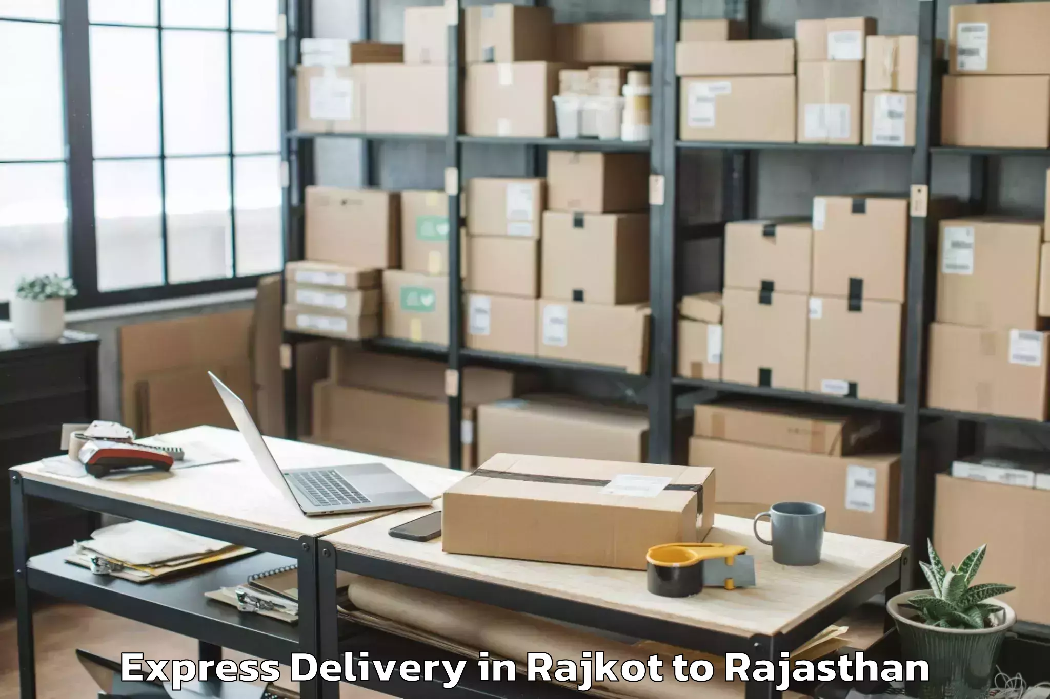 Leading Rajkot to Bari Dholpur Express Delivery Provider